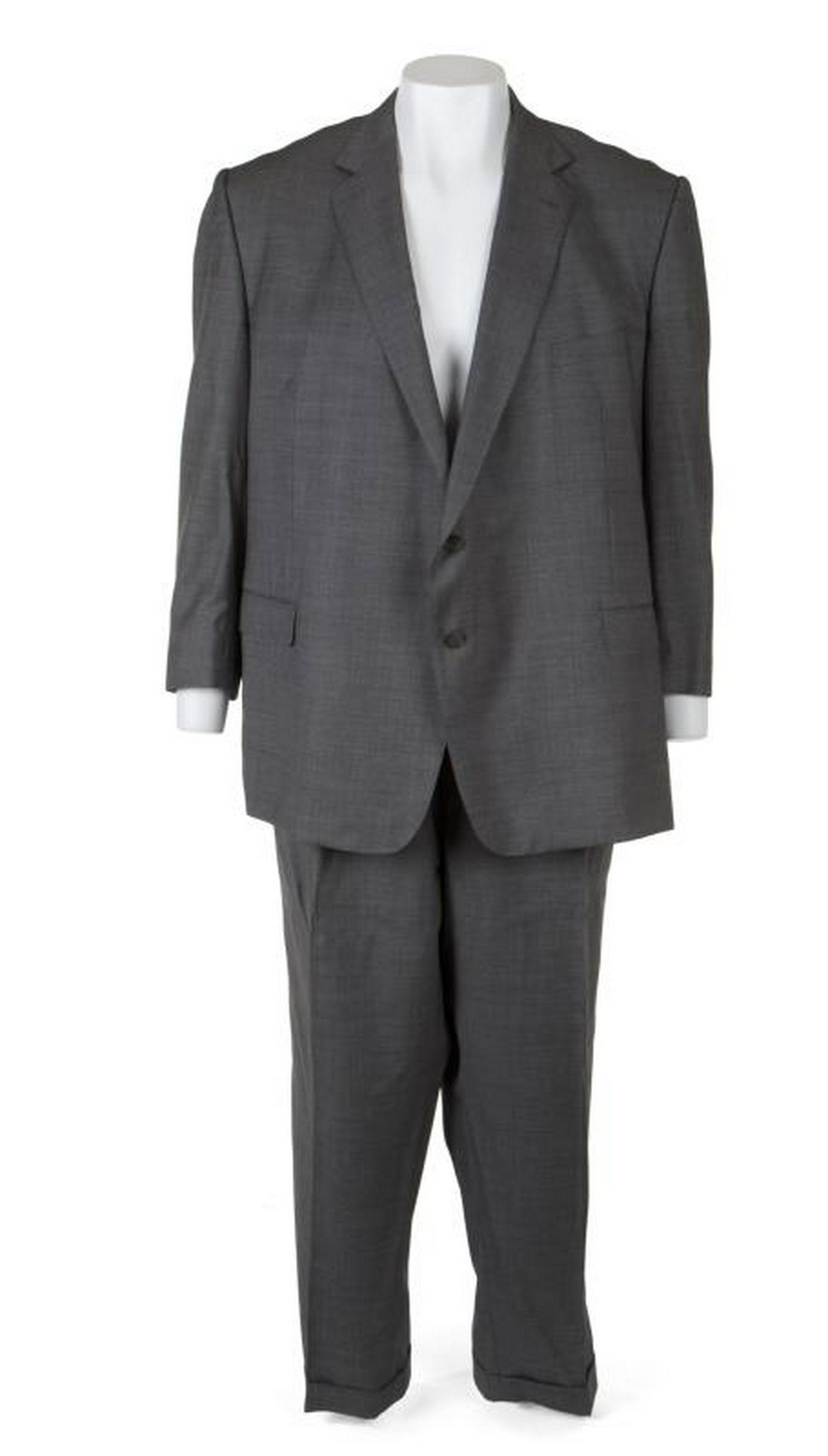 B.B. KING SUIT AND BLAZER: Two grey suits owned by B.B. King. The first is light grey with a label that reads "Ermenegildo Zegna Traveller" inside the coat. Size 72R. The second is charcoal grey with navy blue pinstripes. Label