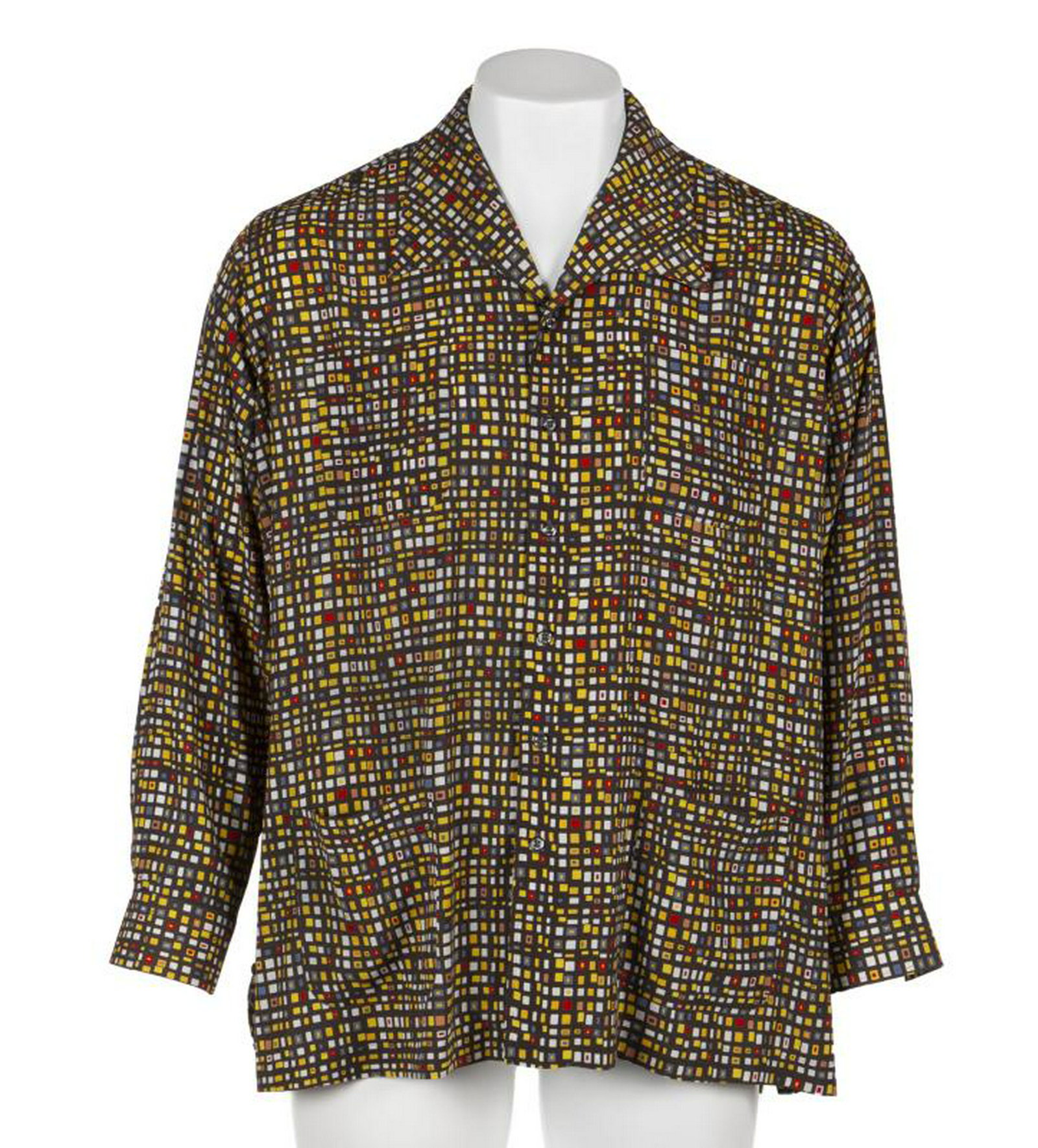 B.B. KING STAGE WORN SHIRT WITH NEWSPAPER ARTICLE: A dark grey long-sleeve shirt with colorful abstract geometric patterns worn by B.B. King while performing at Glastonbury Festival in Somerset, Britain, on June 24, 2011, and again at Red Rocks Amphit