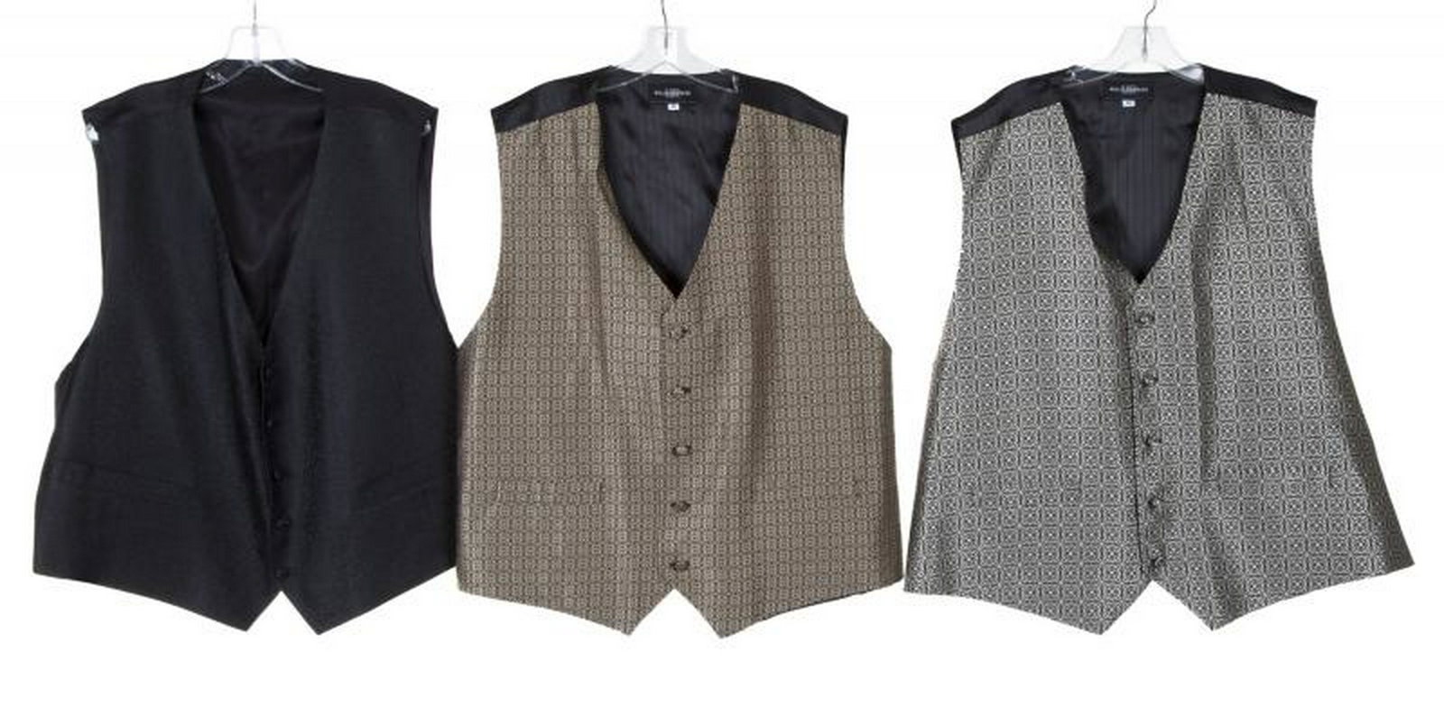 B.B. KING OWNED VESTS: A group of three vests belonging to B.B. King. Two are made by Molly Rodgers and are size 4X. The first is a silver on black stylized floral rosette pattern with solid black lining and back. The secon