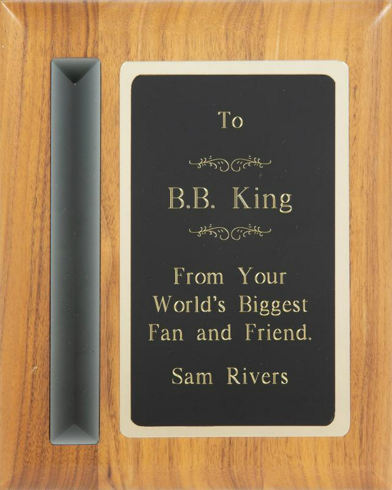 B.B. KING FRIENDSHIP TRIBUTES: A set of two plaques presented to B.B. King: one from Sam Rivers, the other from Big John T-Bone Little dated 2007. 12 by 9 inches PROVENANCE From the Estate of B.B. King BB King