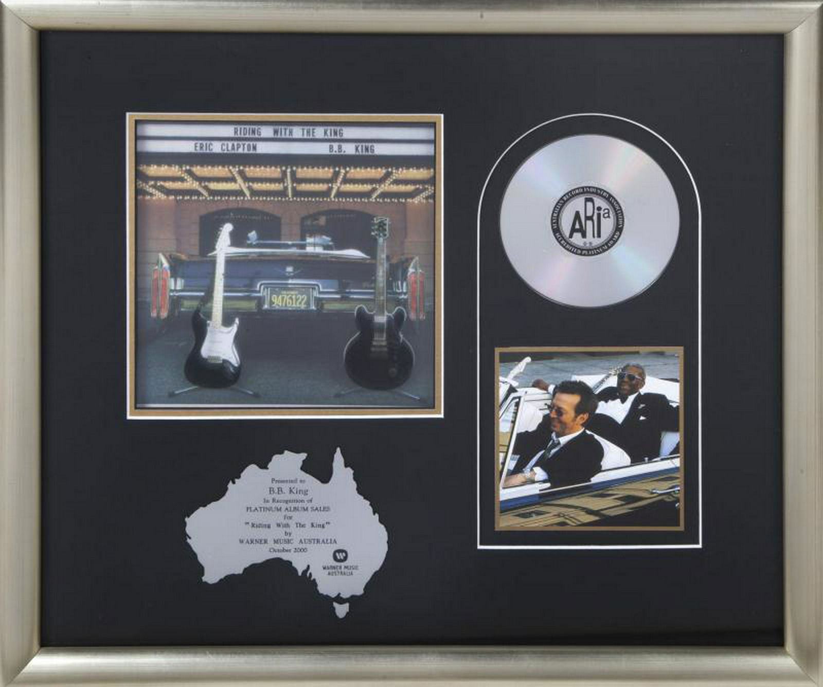 B.B. KING AUSTRALIA PLATINUM AWARD FOR RIDING WITH THE: A Warner Music Australia award, dated October 2000, presented to B.B. King in recognition of "platinum" sales for Riding with the King. 18 1/2 by 21 inches, framed PROVENANCE From the Estate of B.B. K