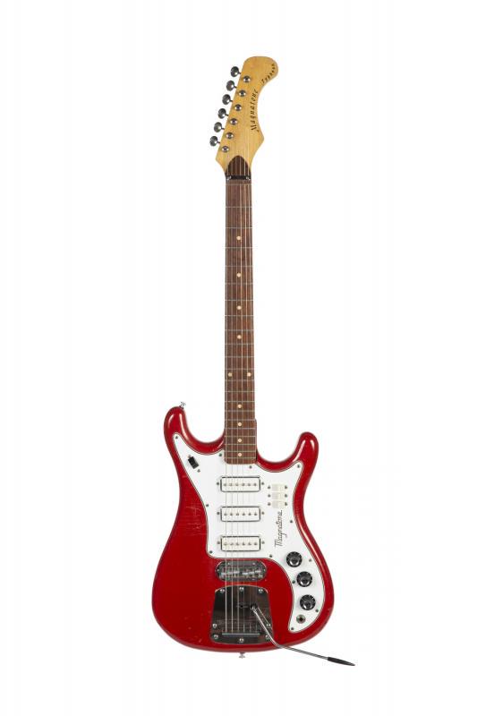 WALTER BECKER 1965 MAGNATONE X-20 TYPHOON: A 1965 Magnatone X-20 Typhoon solidbody electric guitar. The double cutaway poplar body is finished in red and equipped with three magnetic pickups and a “Lever-Lock” vibrato tailpiece. The serial