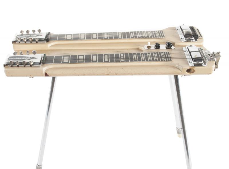 WALTER BECKER RICKENBACKER DW-16 DOUBLE 8 STEEL GUITAR: A Rickenbacker DW-16 console steel guitar circa 1950s. Each 8-string has a 1 1/4-inch horseshoe pickup and one has been customized with a series of knee levers de-tuning two of the strings. One of the