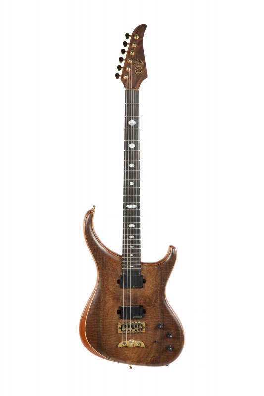 WALTER BECKER ALEMBIC ORION BARITONE GUITAR: A 1995 Alembic Orion guitar constructed in walnut, bubinga, maple and ebony. The guitar features a 28” scale length and two Alembic HG pickups. Serial number 95O8989 stamped to headstock. Accompanie