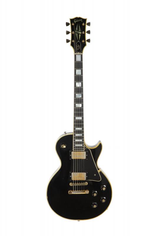 WALTER BECKER 1969/1970 GIBSON LES PAUL CUSTOM: A late 1969/1970 Les Paul custom electric guitar with typical black finish and gold hardware. Featuring a neck volute and stamped to the headstock with serial number 910835, the headstock appears to b