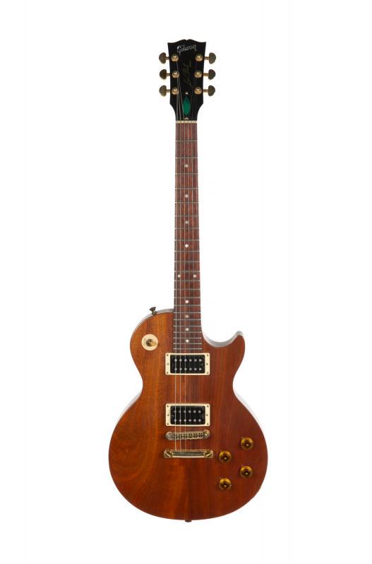 WALTER BECKER GIBSON SMARTWOOD LES PAUL: A SmartWood series Les Paul electric guitar by Gibson. Constructed in mahogany with a muiricatiara top. Serial number 034850616 impressed to headstock. Accompanied by a gig bag. PROVENANCE From the Es