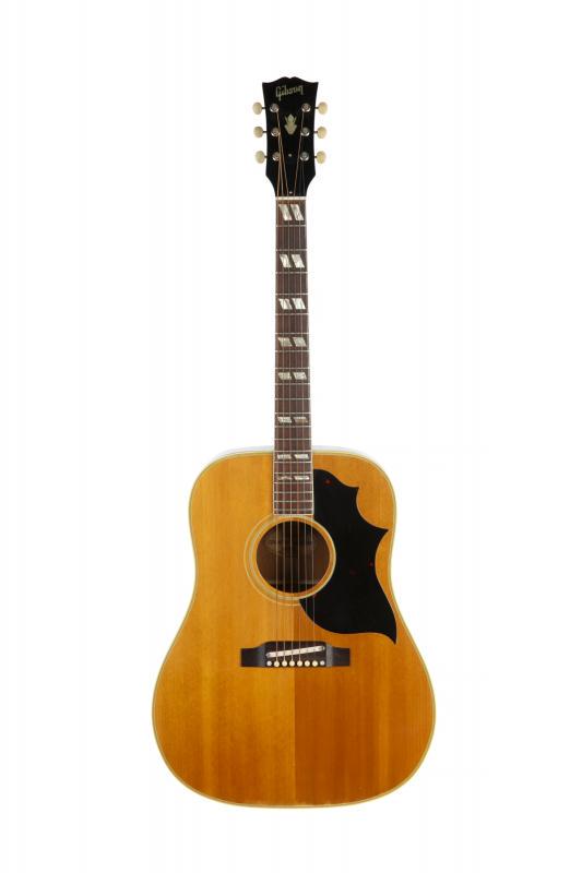 WALTER BECKER 1965 GIBSON COUNTRY WESTERN: A 1965 Gibson Country Western model flat top acoustic guitar. This naturally finished version is constructed in mahogany with a spruce top and rosewood fretboard, serial number 330522. Accompanied by 