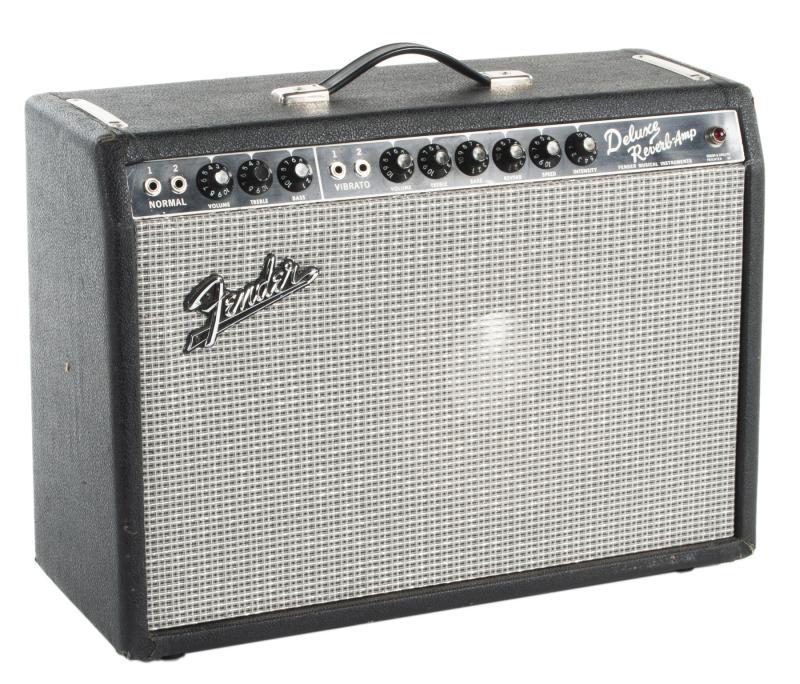 WALTER BECKER 1965 FENDER DELUXE REVERB COMBO AMPLIFIER: A 1965 Fender Deluxe Reverb blackface 1x12 combo amplifier. The cabinet is loaded with a JBL D120F speaker and affixed with a tube chart stamped with the date code OH. The chassis is impressed with th