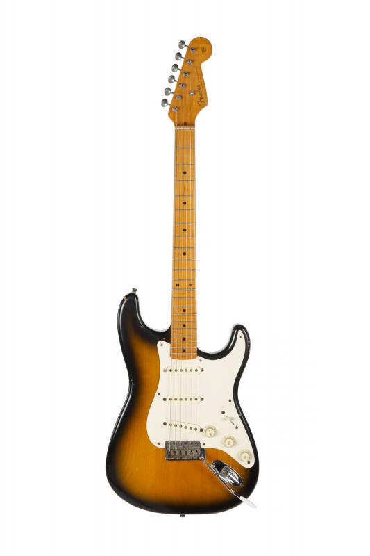 WALTER BECKER 40TH ANNIVERSARY FENDER STRATOCASTER: A 1994 limited edition Fender Stratocaster made with 1954 specifications to commemorate the model’s 40th anniversary. Finished in two-tone sunburst and fitted with a commemorative neck plate. The he