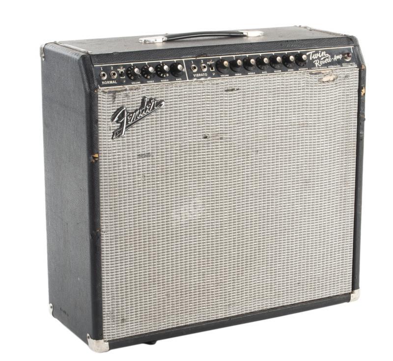 WALTER BECKER FENDER TWIN REVERB COMBO AMPLIFIER: A Fender Twin Reverb combo amplifier that has been modified to be a 1x15 with a black face panel. The amp formerly belonged to the band The Strangers and is currently loaded with a single Kustom SRO15
