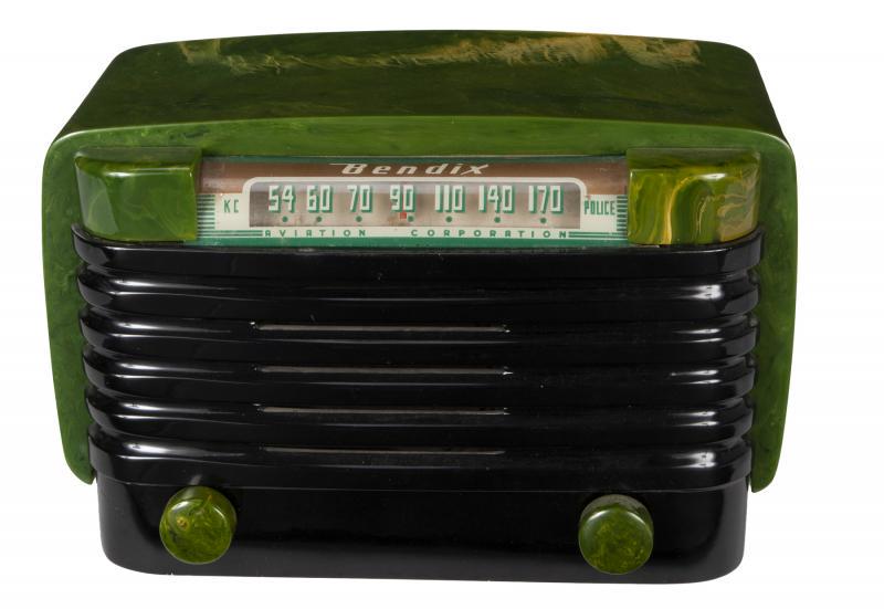 BENDIX 526: 1946. Green and yellow marbleized case with matching knobs and black wraparound grille. 11 1/8 by 7 by 6 inches Radio