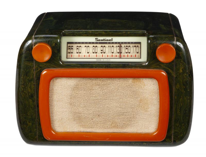 SENTINEL 284NB: 1945. Blue and white marbleized case with yellow knobs and speaker bezel. 7 1/2 by 11 by 6 1/8 inches Radio