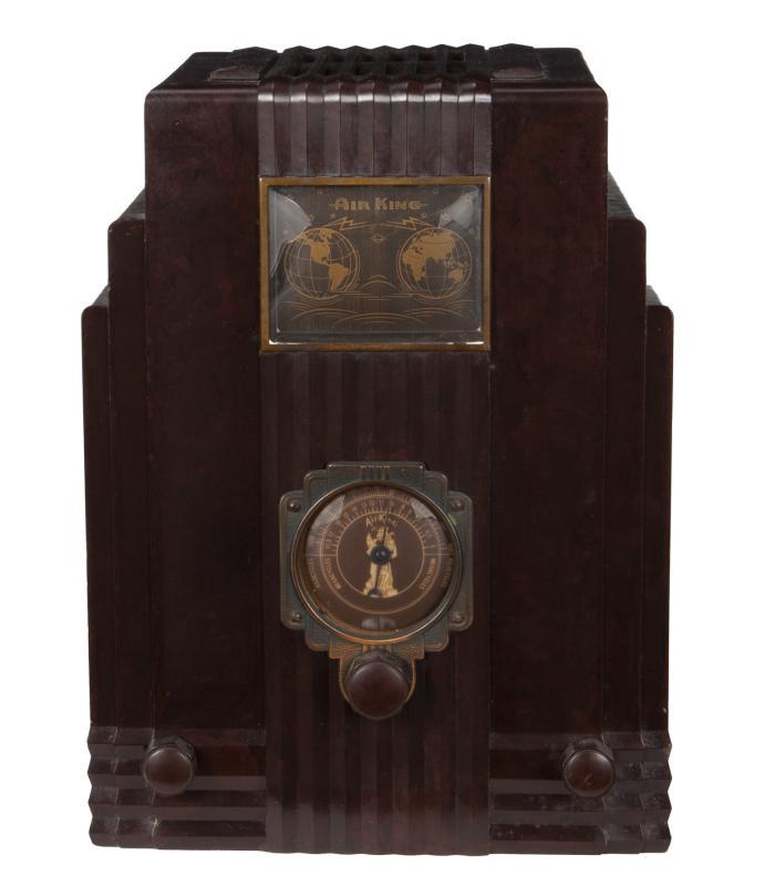 AIR KING SKYSCRAPER: 1933. Designed by Harold Van Doren. Bakelite case with bakelite knobs and black world dial. 11 3/4 by 8 3/4 by 6 3/4 inches Radio