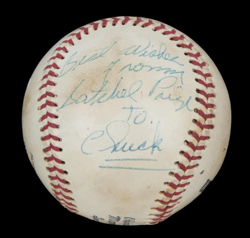 SATCHEL PAIGE SIGNED AND INSCRIBED BASEBALL: A Wilson Official League Baseball signed and inscribed by Satchel Paige. The baseball is inscribed in blue ink "Best Wishes/ From Satchel Paige/ To Chuck." Accompanied by a letter of authenticity from