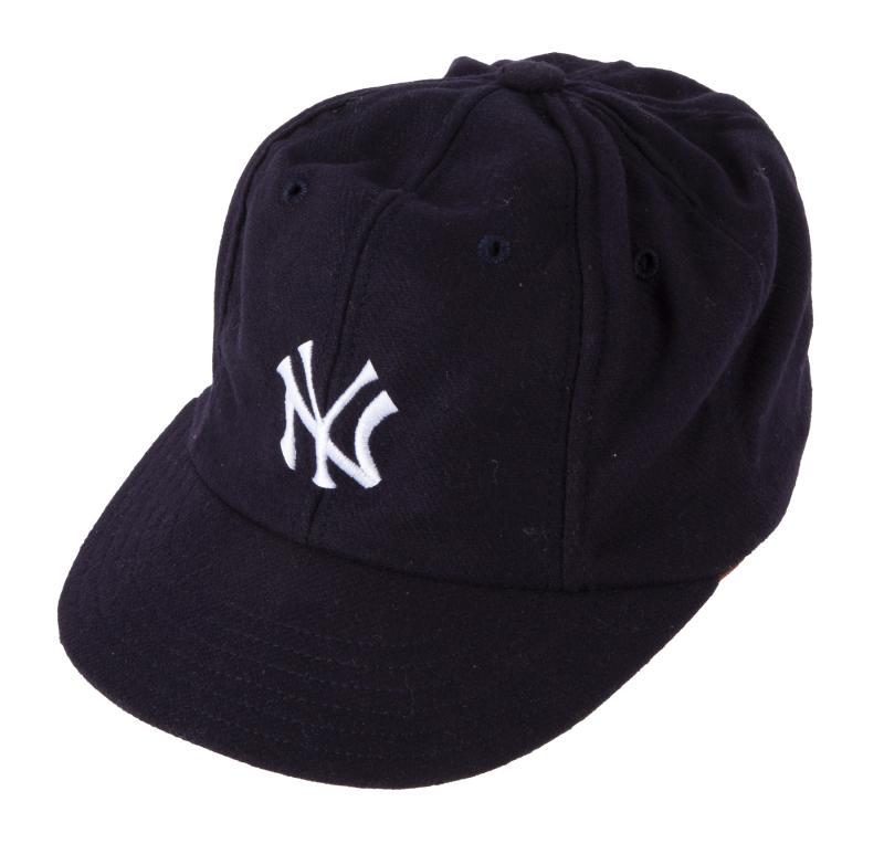 JOHN GOODMAN MOVIE WORN BASEBALL CAP: A New York Yankees baseball cap, designed and made by Cooperstown Ball Cap Co. (now known as Ideal Cap Company), worn by actor John Goodman while portraying Babe Ruth in the film "The Babe" (Universal