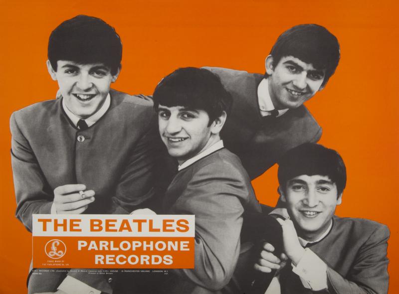 THE BEATLES 1963 PARLOPHONE RECORDS POSTER: An original EMI Parlophone Beatles promotional poster from 1963 featuring The Beatles in black and white on a bright orange background. The poster is from the collection of a Scotland-based EMI repres