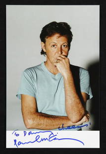 PAUL McCARTNEY SIGNED PHOTOGRAPH: A blank postcard with a photograph of Paul McCartney on the front, taken by his daughter Mary McCartney in 2000. The photograph is inscribed in blue felt pen "To Danny cheers! Paul McCartney." Accompa