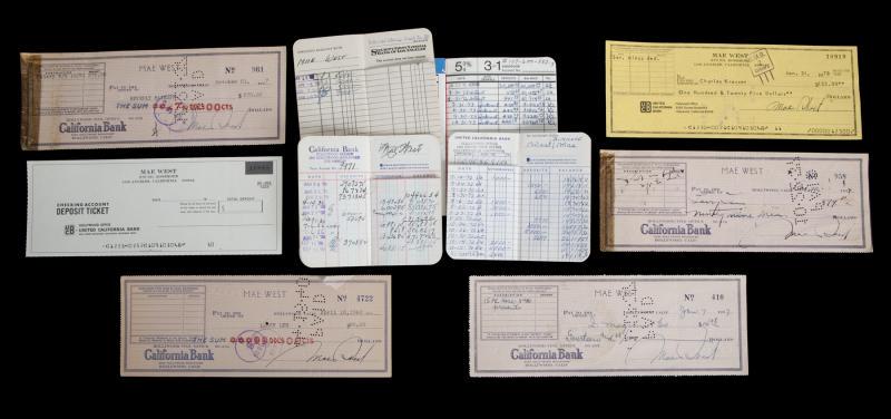 MAE WEST BANK LEDGERS AND CHECKS: A small California Bank Term Account ledger with notes dating from March 23 to September 11, 1936. A small United California Bank dating from 12-31-68 to 11-30-72. A small ledger from Security-First N