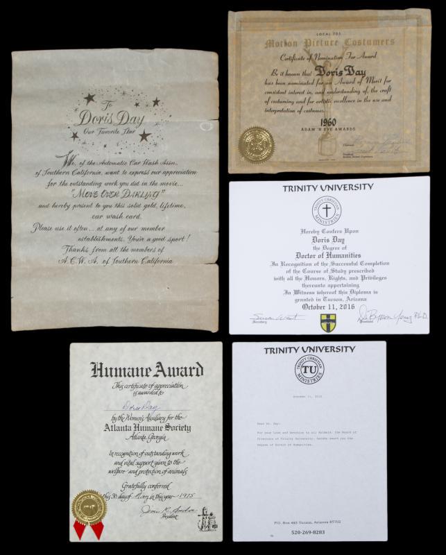 DORIS DAY AWARDS FROM 1960, 1962, 1963, 1975, and 2016: Request condition report! A group of five certificates; all presented to the actress including: 1) for “Outstanding Work” in Move Over, Darling by the Automatic Car Wash Association of Southern Ca