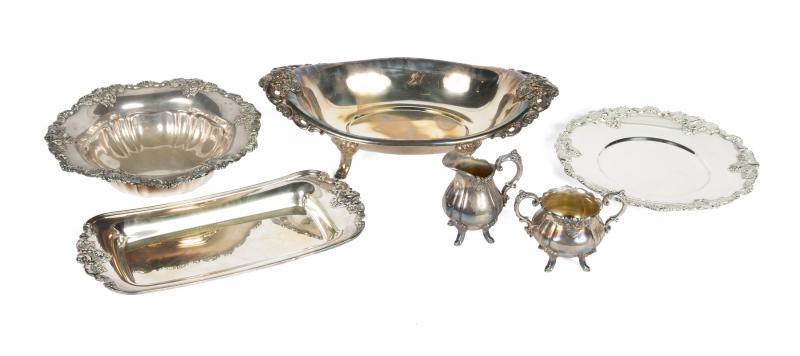 DORIS DAY WALLACE SILVER PLATED SERVEWARE: Request condition report! A group of Wallace tableware in the Baroque pattern, including a footed oval bowl, a round bowl, a round dish, a rectangular dish, and a sugar bowl and cream pitcher. Largest