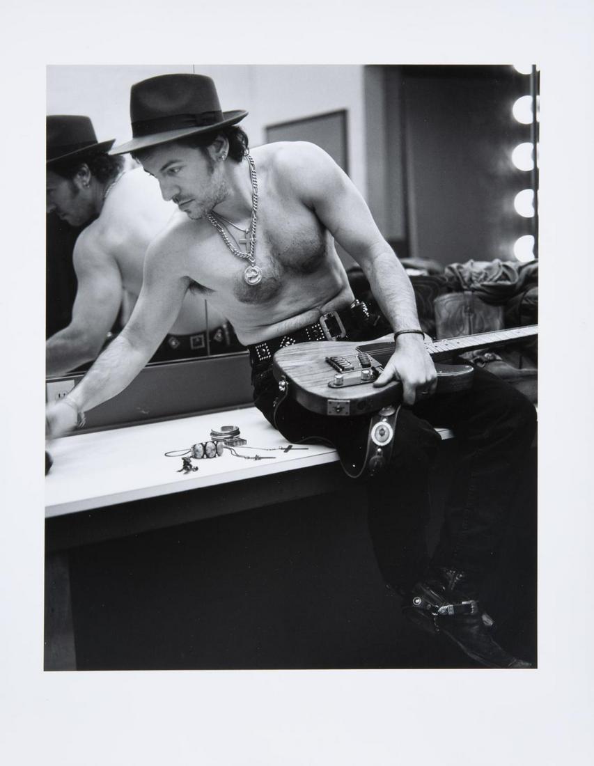 BRUCE SPRINGSTEEN PHOTOGRAPH BY ANNIE LEIBOVITZ: A black and white gelatin silver photograph of Bruce Springsteen in his dressing room taken by photographer Annie Leibovitz, no stamps or signatures present. 14 by 11 inches Rock 'N' Roll