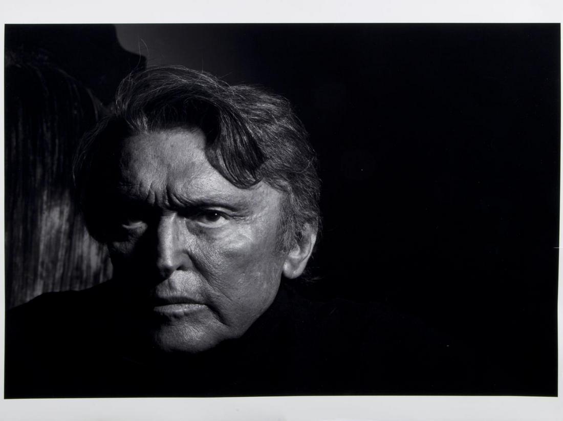 ROBERT EVANS PORTRAIT BY MICHEL COMTE: A large format black and white bust length portrait of Robert Evans. 17 1/2 by 24 inches, image; 20 by 24 inches, sheet PROVENANCE From the Estate of Robert Evans Hollywood