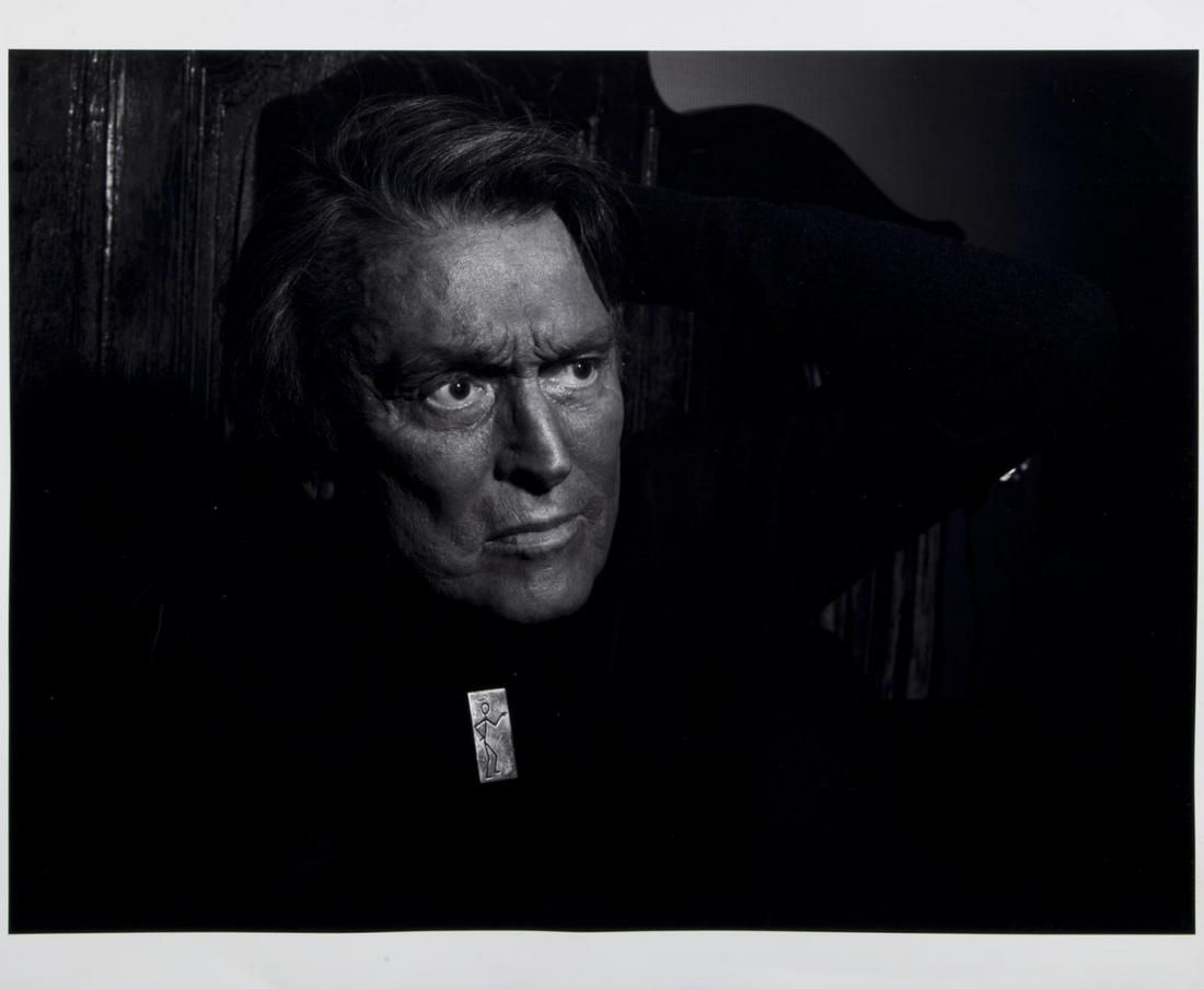 ROBERT EVANS PHOTOGRAPH BY MICHEL COMTE: A large format black and white bust length portrait of Robert Evans wearing one of his signature bolo ties, "The Saint.". 17 1/2 by 24 inches, image; 20 by 24 inches, sheet PROVENANCE From the Estate