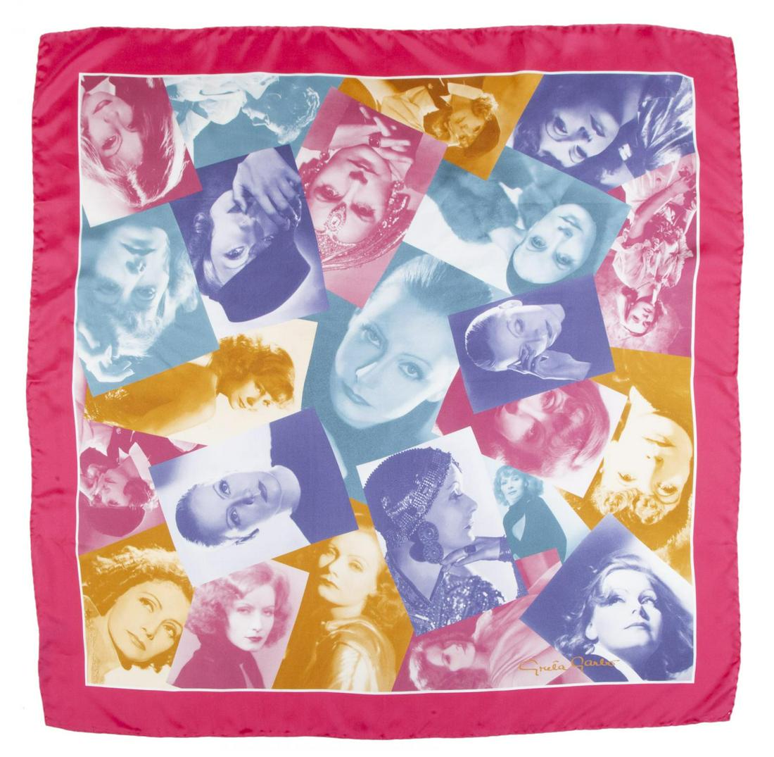 GRETA GARBO LIMITED EDITION SILK SCARF: A never-used square-shaped silk scarf with handrolled edges featuring various photographic images of Greta Garbo in beautiful jewel tones with her facsimile signature printed in the lower left corner.