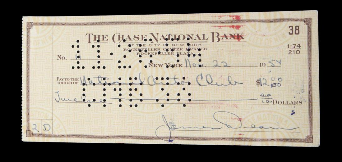 JAMES DEAN SIGNED CHECK: A counter check from The Chase National Bank in New York City written out in black felt-tip ink by James Dean to “National Auto Club” on “Nov. 22, 1954” in the amount of “