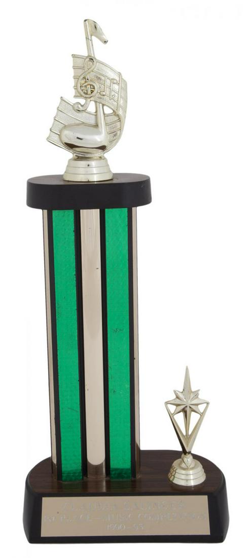 LACEY CHABERT PROP TROPHY FROM PARTY OF FIVE: A prop trophy with a plaque reading “Claudia Salinger/ 1st Place - Music Competition/ 1990-93” used by a young Lacey Chabert playing Claudia on the popular 1994-2000 Fox Network television