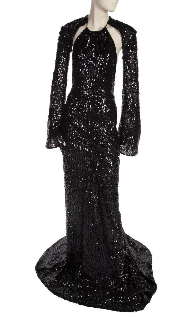 ANGELINA JOLIE MARK ZUNINO GOWN WORN FOR PATRICK: A slender-fitting gown covered with jet-like sequins worn by Angelina Jolie in a photoshoot by Patrick Demarchelier that was featured in an Italian magazine circa 2008. The gown has a plunging back, l