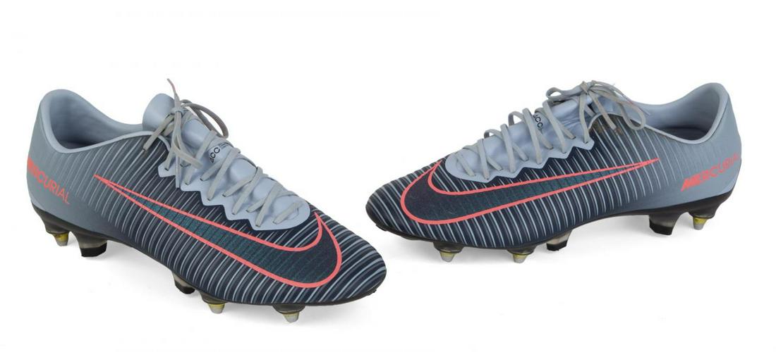 KYLIAN MBAPPÉ 2017 MATCH WORN BOOTS: A pair of Nike brand Mercurial football boots match worn by Kylian Mbappé during an international match in 2017 with the France national team. The inner exterior of the right boot features “