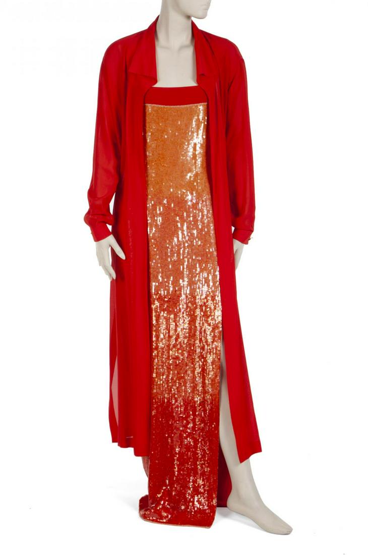 WHITNEY HOUSTON EVENT WORN ESCADA GOWN AND MAGAZINE: An orange ombré sequin-covered silk gown worn by Whitney Houston to a Versace fashion show circa 1998. The gown has a silk band and halter strap that Houston tucked into the dress. An Escada labe
