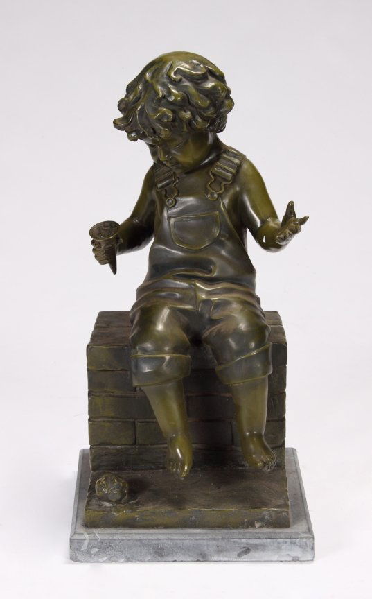 PATINATED METAL SCULPTURE OF A BOY SITTING ON A PIL: Variegated patinated bronze statue featuring a young boy in overalls having just lost the ice cream off of a cone. On a marble base. Signed "Frank D. Ark." Dimensions: 33 by 16 inches