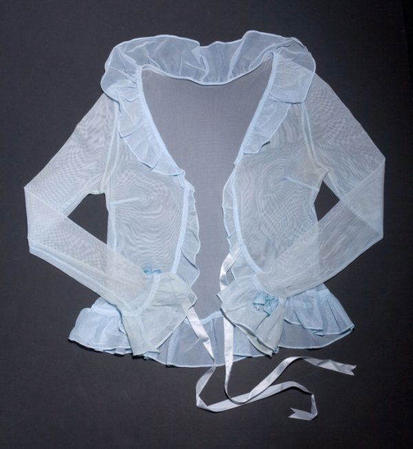 LINGERIE FROM MISS OCTOBER 2000 PICTORIAL: Nicole Van Croft worn lingerie from her October 2000 Playboy pictorial, ensembles include polka dot panties and bracelets from centerfold picture, blue panties, white bra and panty set, and blue sleep