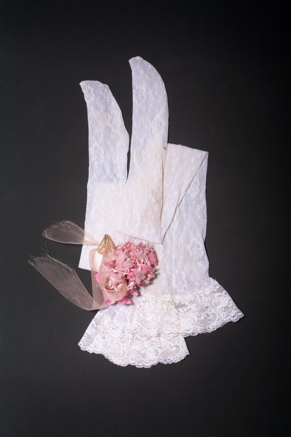 TINA JORDAN WORN NYLONS FROM PLAYBOY PICTORIAL: Tina Jordan worn white lace thigh high nylons and flower prop from her March 2002 Playmate pictorial. Accompanied by this issue of Playboy.