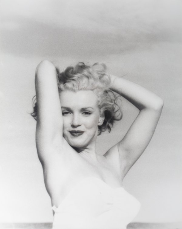 MARILYN MONROE VINTAGE PHOTOGRAPH BY DE DIENES: Vintage print of Marilyn Monroe taken in 1949 by Andre De Dienes. It is a beautiful silver gelatin print, hand printed circa 1958 and stamped by the artist, printed on a double weight fiber paper, in