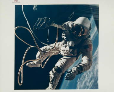 NASA GEMINI 4 ED WHITE SPACEWALK PHOTOGRAPH: An original NASA color photograph featuring astronaut Ed White floating in space on a tether attached to Gemini 4. The photograph bears the red number S-65-30433 and is marked on the verso A Kodak