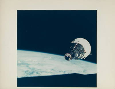 NASA GEMINI 7 PHOTOGRAPH: An original NASA color photograph featuring Gemini 7 as seen from Gemini 6. The photograph corresponds to number S-65-63188 and is marked on the verso A Kodak Paper. 8 by 11 inches