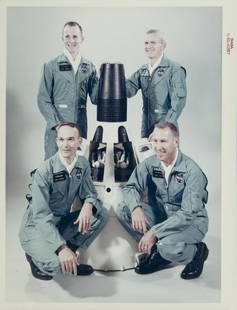 NASA GEMINI 7 ASTRONAUTS PHOTOGRAPH: An original NASA color photograph featuring the prime crew and backup crew of Gemini 7, including astronaut Michael Collins. The photograph bears the red number S-65-41827 and is marked on the verso