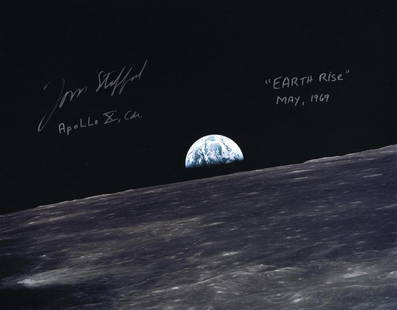 TOM STAFFORD SIGNED APOLLO 10 EARTHRISE PHOTOGRAPH: A superb large-format color photograph of the Earth rising above the surface of the Moon taken from the Apollo 10 Lunar Module and signed by NASA astronaut and Apollo 10 Commander, Thomas P. Stafford