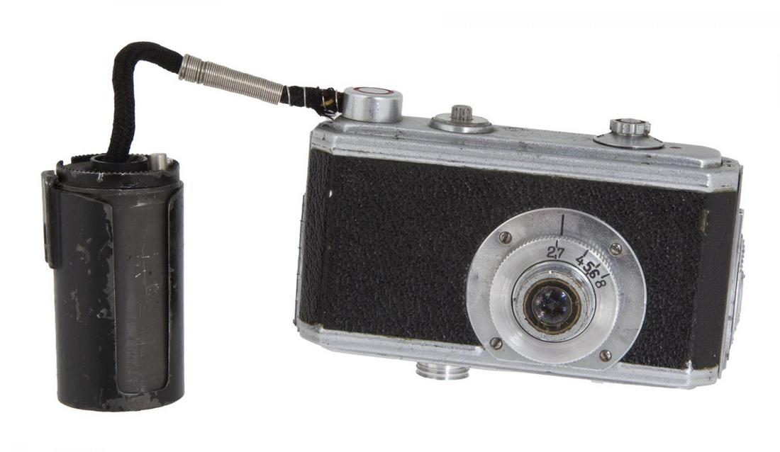 SOVIET NKVD SPY UFA CAMERA: A Soviet NKVD spy "UFA" camera. 3 1/2 by 2 by 1 1/4 inches