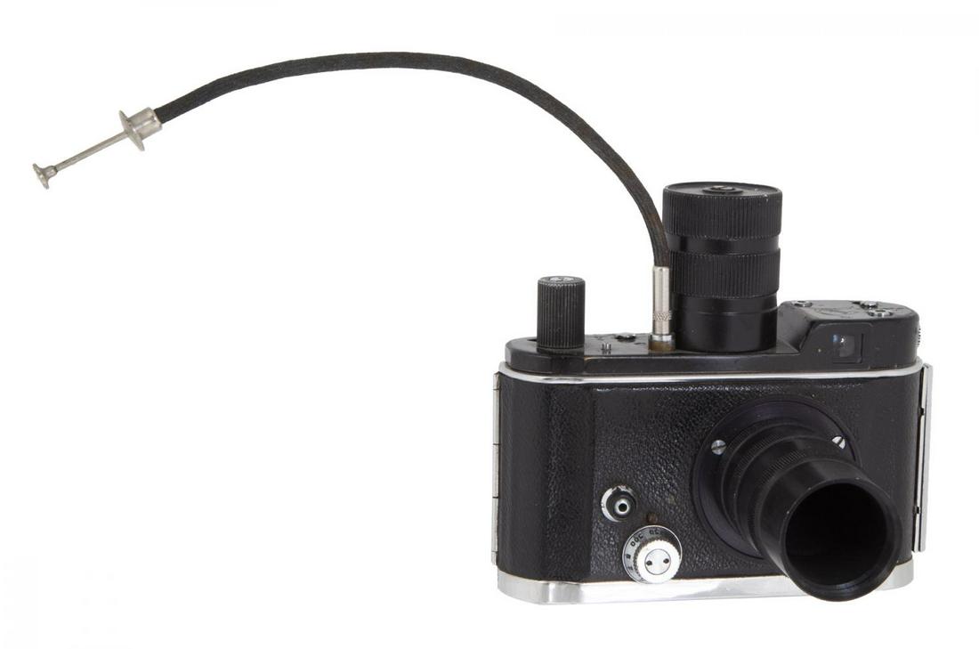 SOVIET KGB SPY FSN CAMERA: A Soviet KGB spy FSN camera developed in Leningrad as an exact copy of the German Robot model camera. 4 1/4 by 3 1/2 by 3 3/4 inches