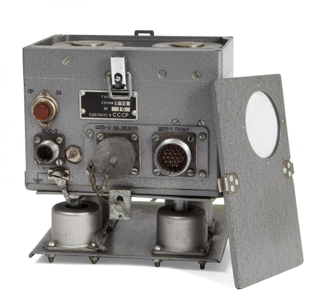 SOVIET KGB SPY STEEL WIRE RECORDER FOR AUTOMOBILES: A Soviet KGB spy steel wire recorder designed for use in moving vehicles. 7 by 6 3/4 by 6 1/4 inches