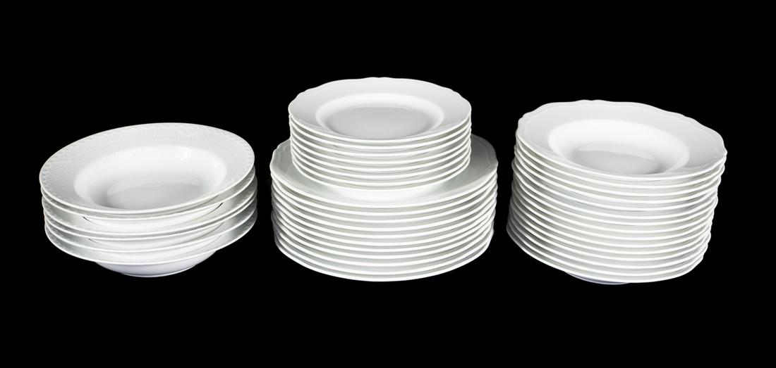 SET OF RICHARD GINORI AND OTHER CHINA PLATES: A set of Ginori plates in the Antico Doccia pattern, including eleven dinner plates, eight salads, and 15 rim soup bowls, together with a set of six Royal Copenhagen Fluted Half Lace rim soup bowls. 4