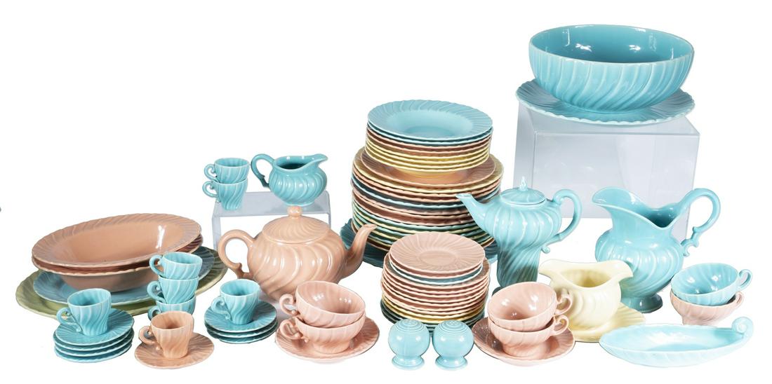 SET OF GLADDING MCBEAN FRANCISCAN DINNERWARE: A set of Franciscan glazed earthenware plates in the Coronado Swirl pattern in turquoise, yellow and pink, including: 14 dinner plates, six salads, 12 bread and butter plates, two fruit bowls, two cer