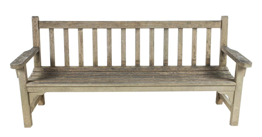 SMITH & HAWKEN OAK GARDEN BENCH: A weathered oak garden bench by maker Smith & Hawken, circa 2002. 33 1/2 by 73 1/2 by 25 inches Fine Art