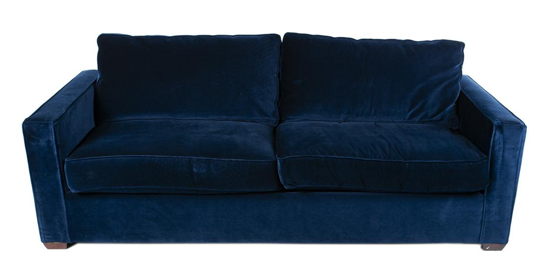 BLUE VELVET SOFA BED: A queen size sofa bed with air mattress upholstered in plush blue velvet fabric. 28 by 84 1/2 by 35 1/2 inches (closed) PROVENANCE Design Within Reach, New York Fine Art