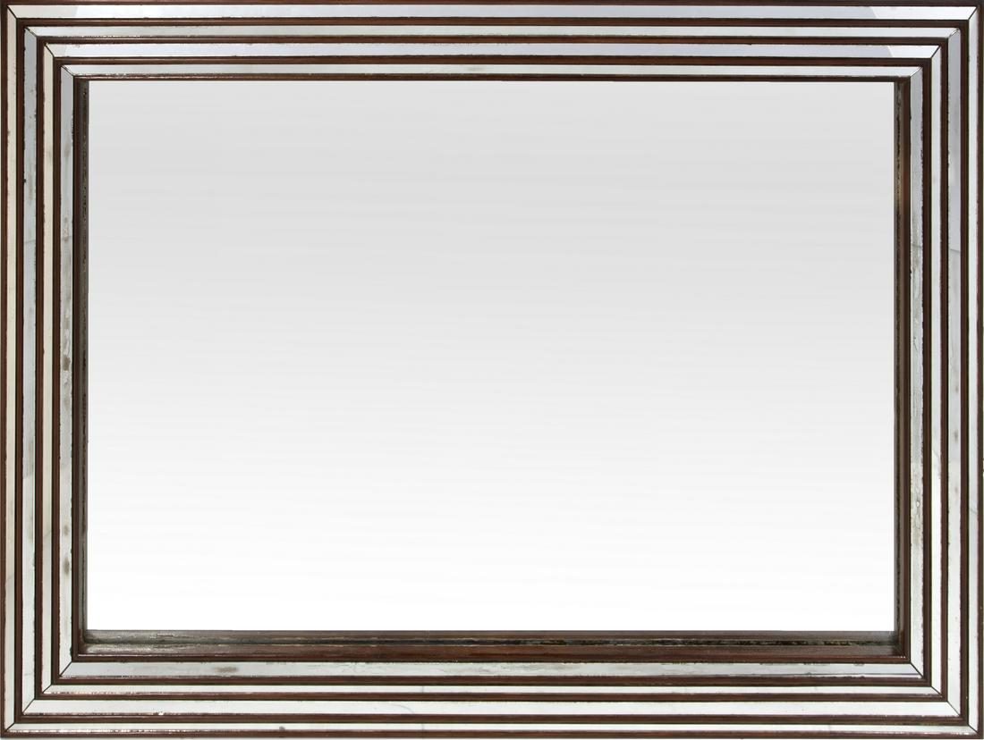 ANTIQUE MIRROR WITH MIRROR BORDER PANELS: A walnut frame mirror with mirrored border panels and silvered mirror glass. 49 1/2 by 35 1/4 inches Fine Art