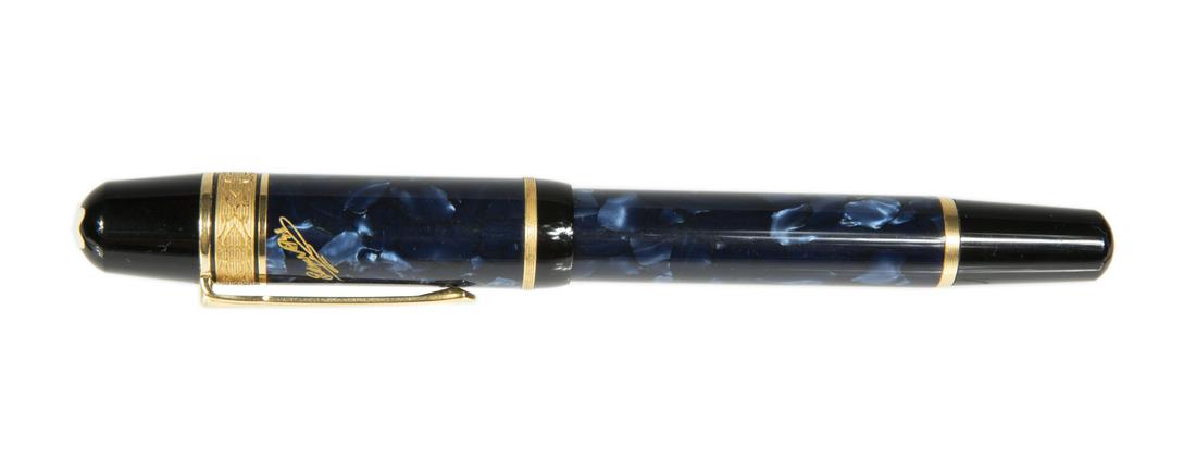 MONTBLANC MEISTERSTUCK LIMITED EDITION EDGAR ALLEN POE: A midnight blue marbled resin and gold trim Montblanc Meisterstuck fountain pen, style number 75250 M, limited edition number 06503/20000, in a black leather Montblanc pen holder. Fine Art